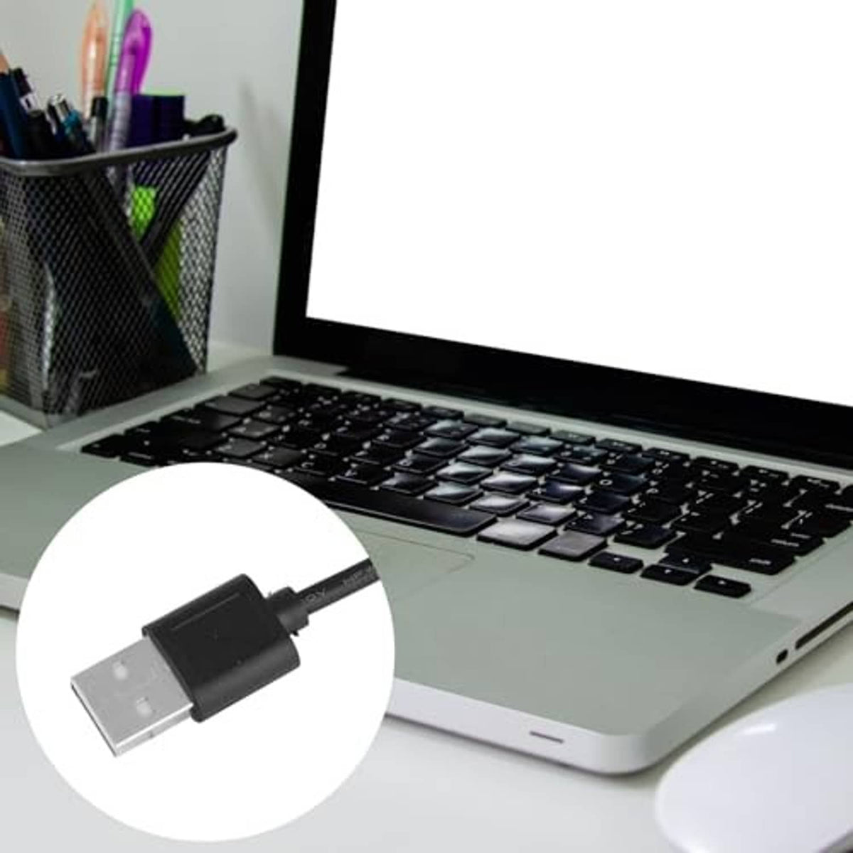 USB fan speed adapter cable plugged into a laptop USB port with black inline controller