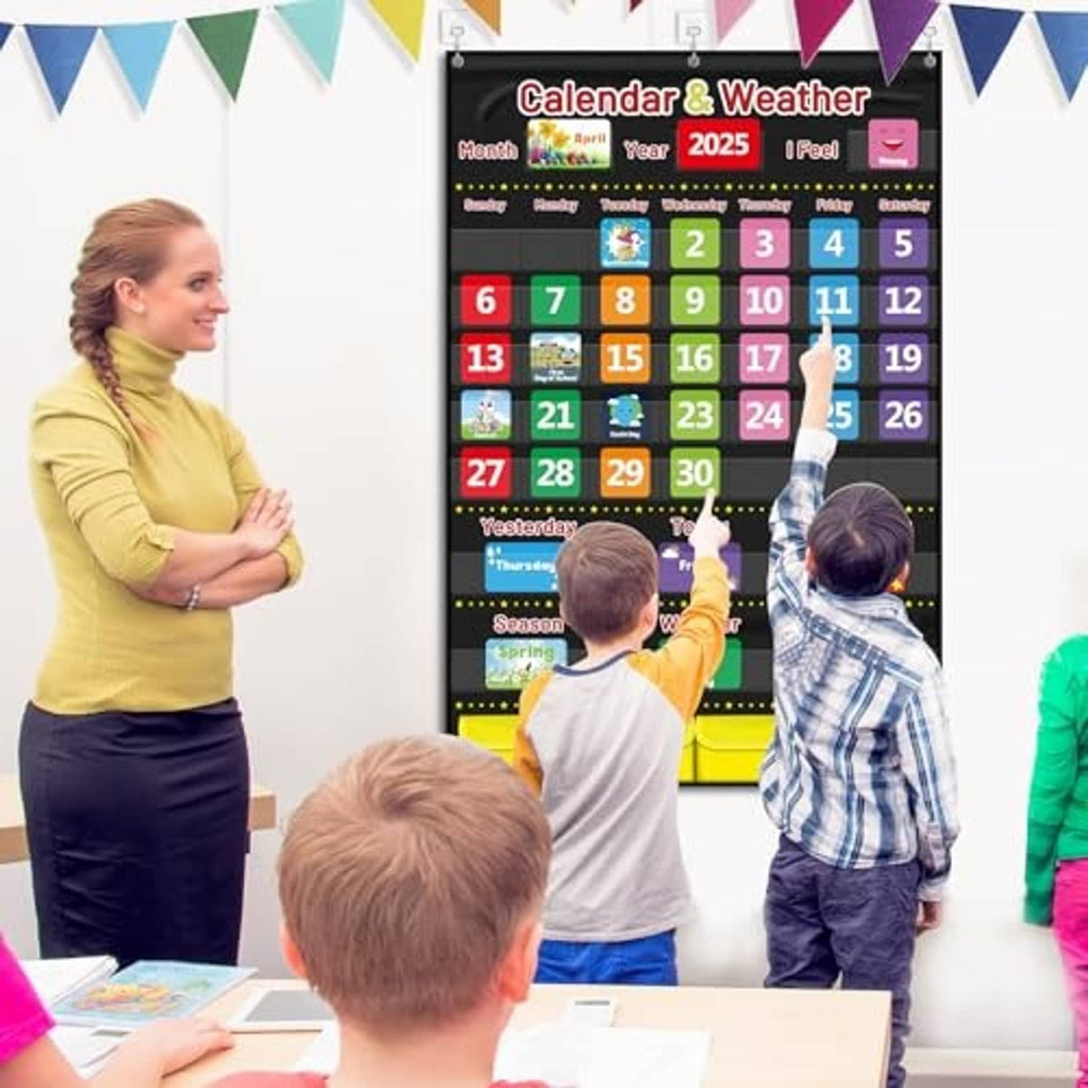 Kids using a black calendar & weather pocket chart with colored date squares