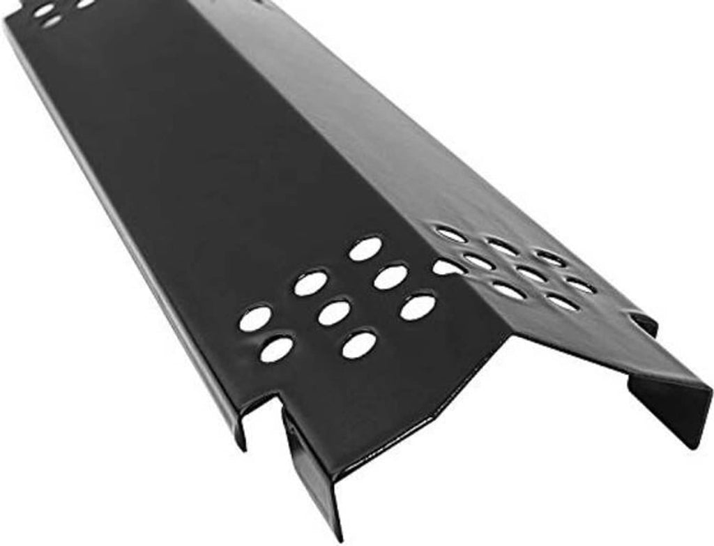Close-up grill heat plate with oval and round vent holes across a dark panel