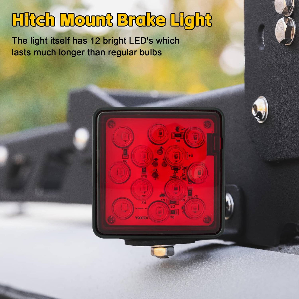 Black hitch-mounted brake light with red 12-LED panel on trailer hitch bar