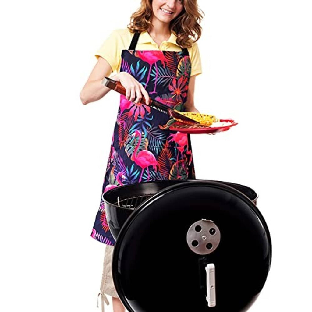 Flamingo waterproof bib apron with adjustable straps, worn while cooking