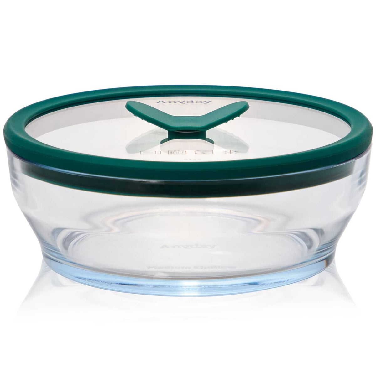 Clear round glass food storage container with dark green silicone lid, medium size