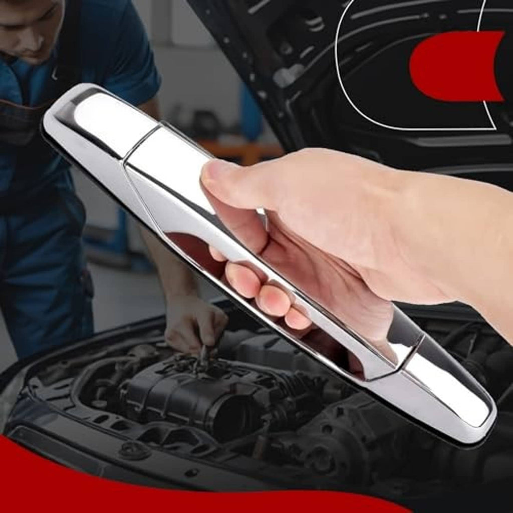 Hand holding polished chrome exterior door handle; mounting area visible