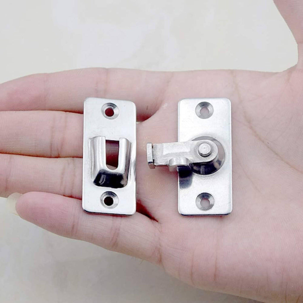 Stainless steel door hasp latch in hand, showing U-shaped locking opening