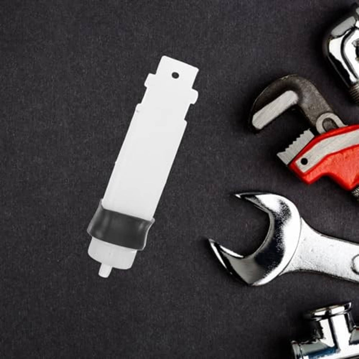 Coolant overflow bottle with translucent white spout and black rubber seal