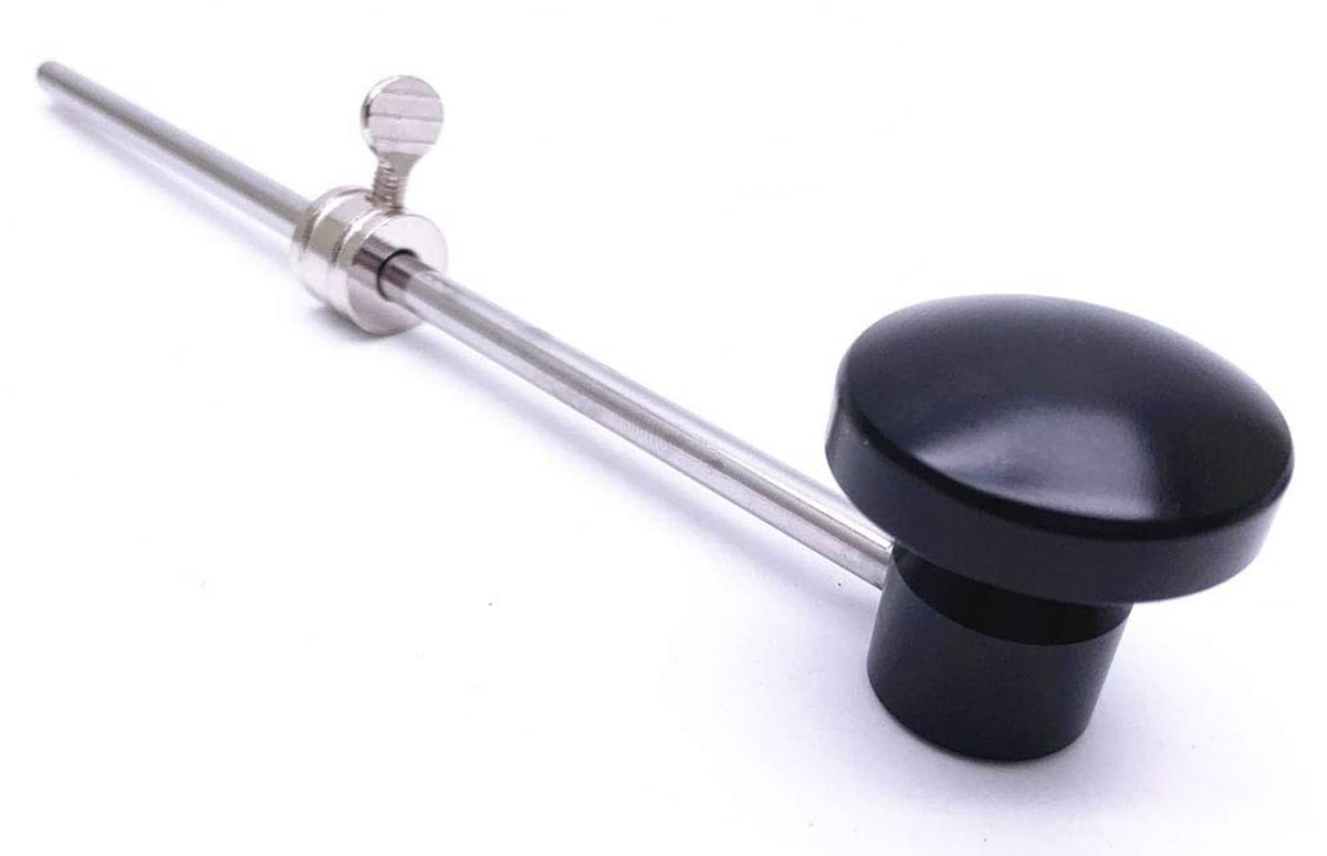 Bass drum pedal beater with black rounded head on chrome shaft and clamp