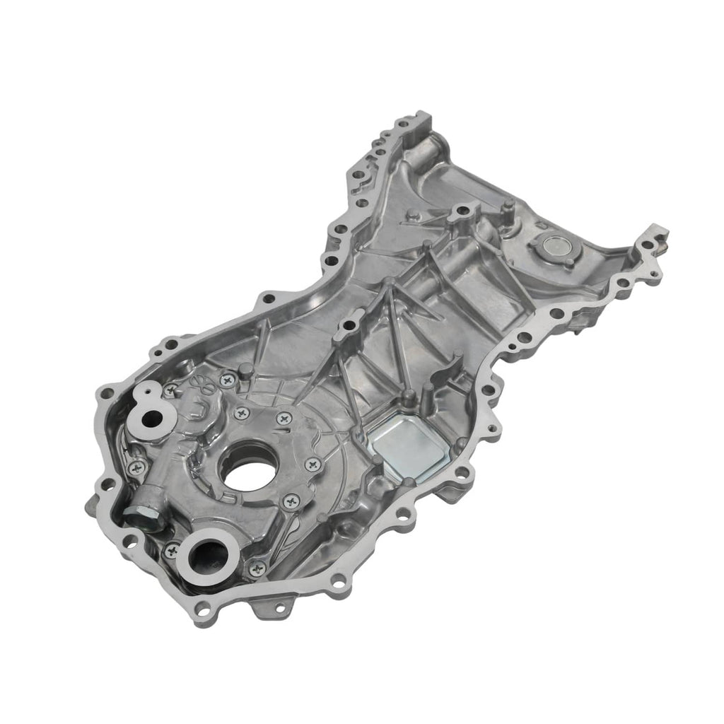 Oil pump housing with circular ports, bolt holes, and raised regulator area