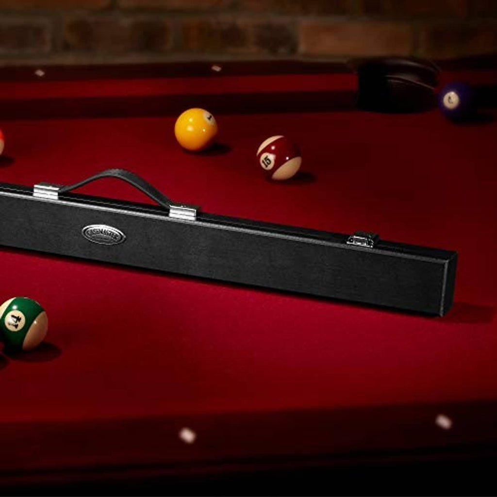 Black billiard cue hard case on a pool table, showing the handle and latch