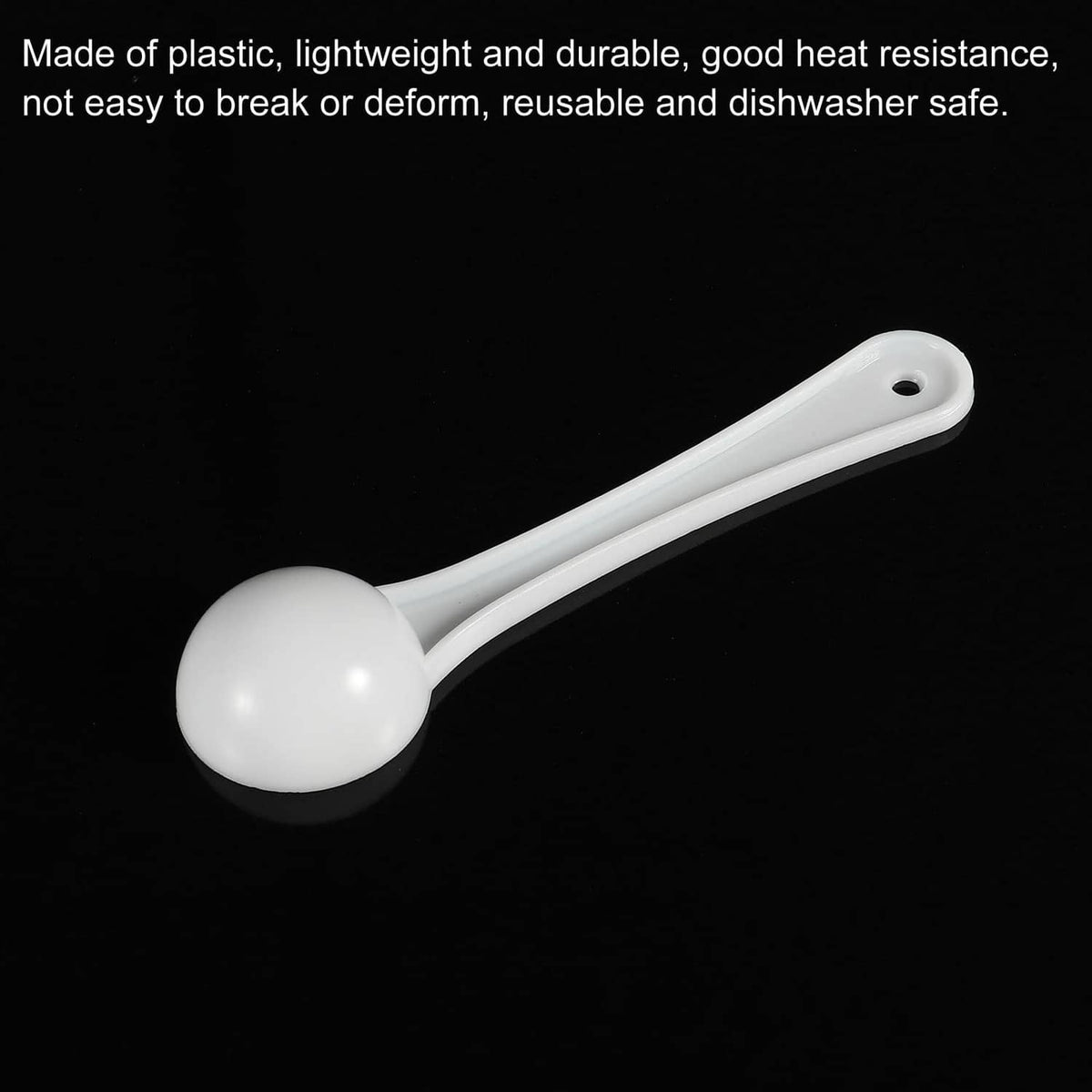 White plastic micro measuring scoop with round bowl, curved handle, small hole
