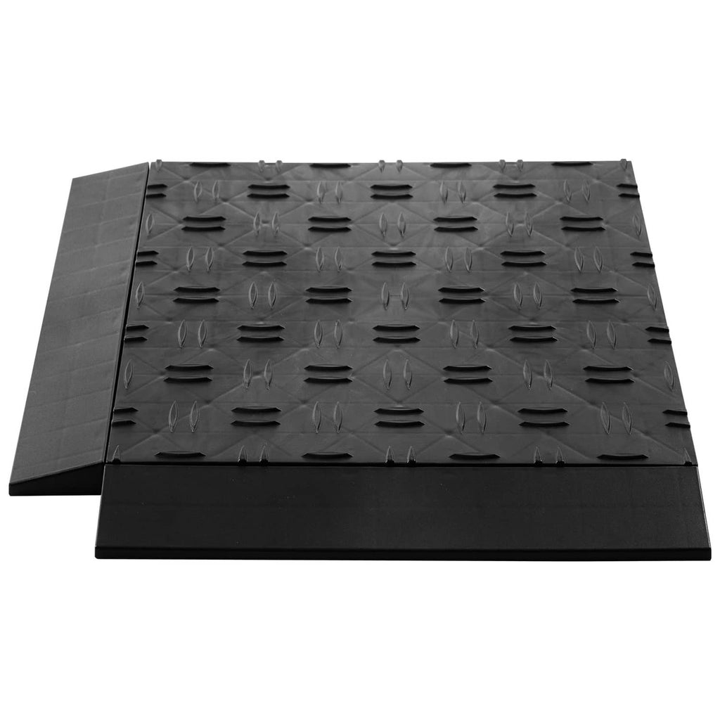 Black textured interlocking floor tiles with overlapping edge connection