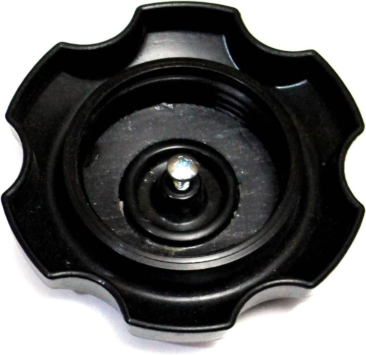Black jet ski fuel cap interior view with metal screw and recessed seal seat