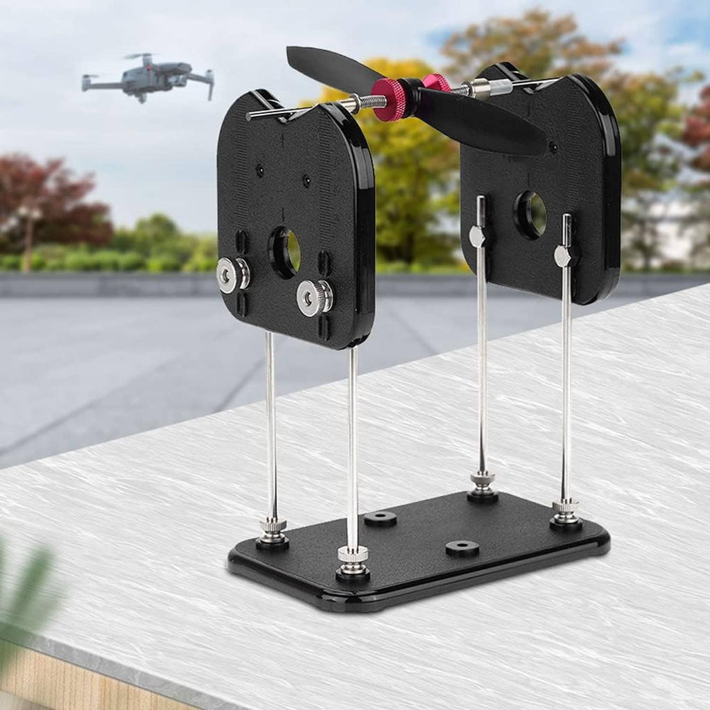 RC prop balancer stand with two black prop holders and three silver balancing rods