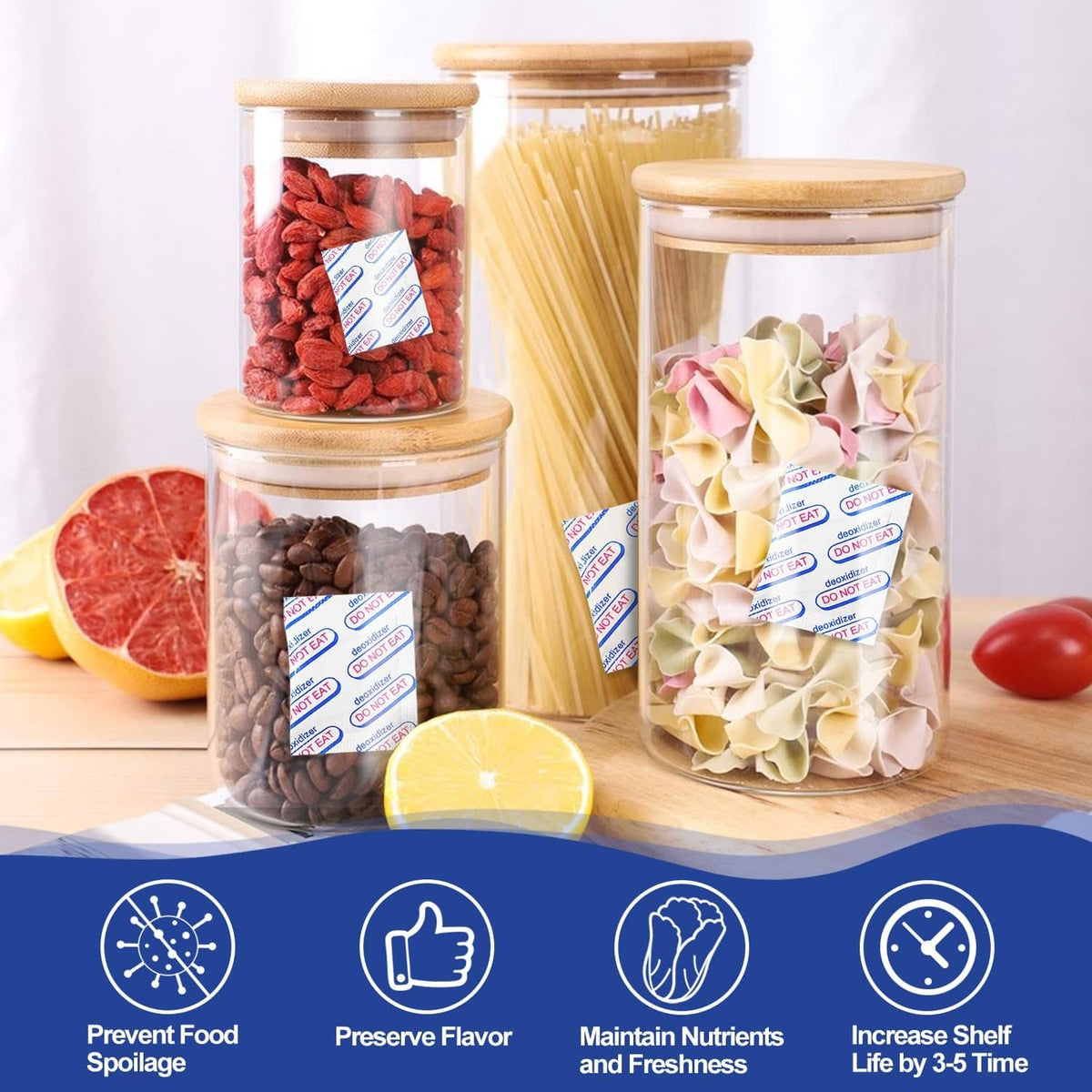Oxygen absorber sachets placed in glass storage jars with snacks and grains