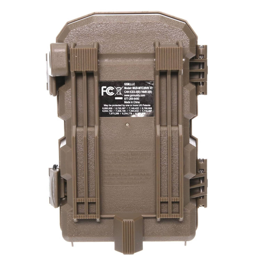 Back of trail camera with FCC label, mounting brackets, and cable terminals.