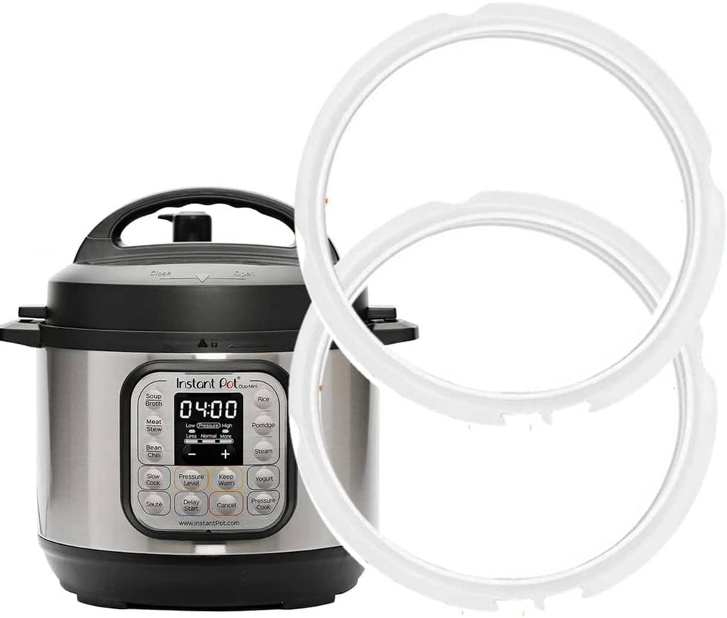 White silicone sealing gasket ring for pressure cooker lid, shown with cooker base