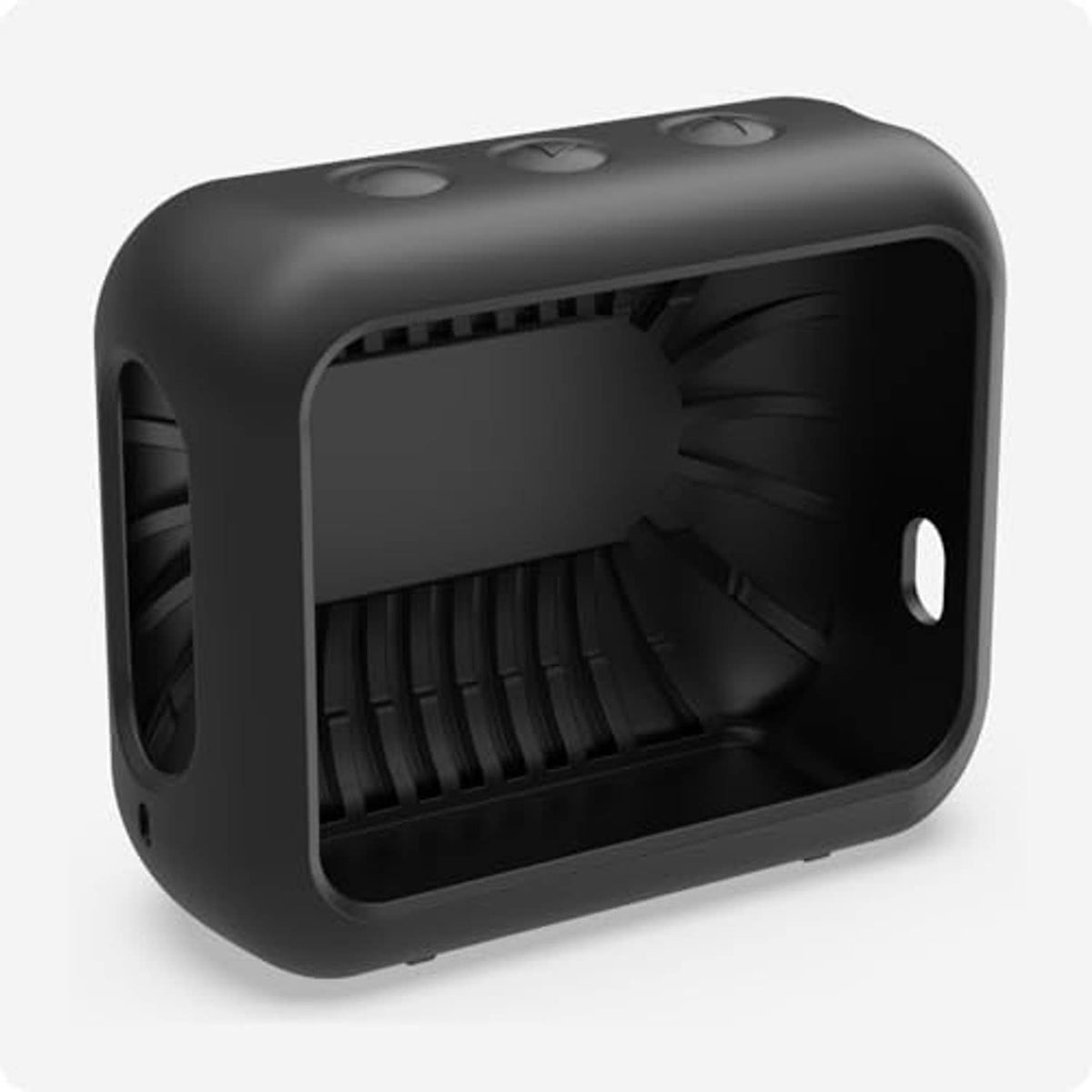 Dark silicone speaker case with open interior and port cutouts