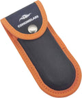 Nylon knife sheath with black body and orange trim, snap-button closure