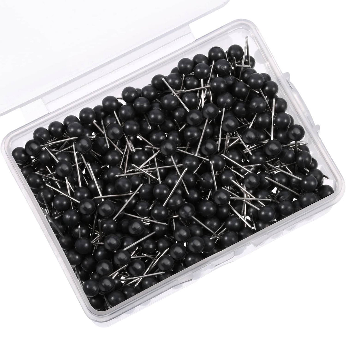 Black push pins with round heads and metal tips in a clear plastic container.