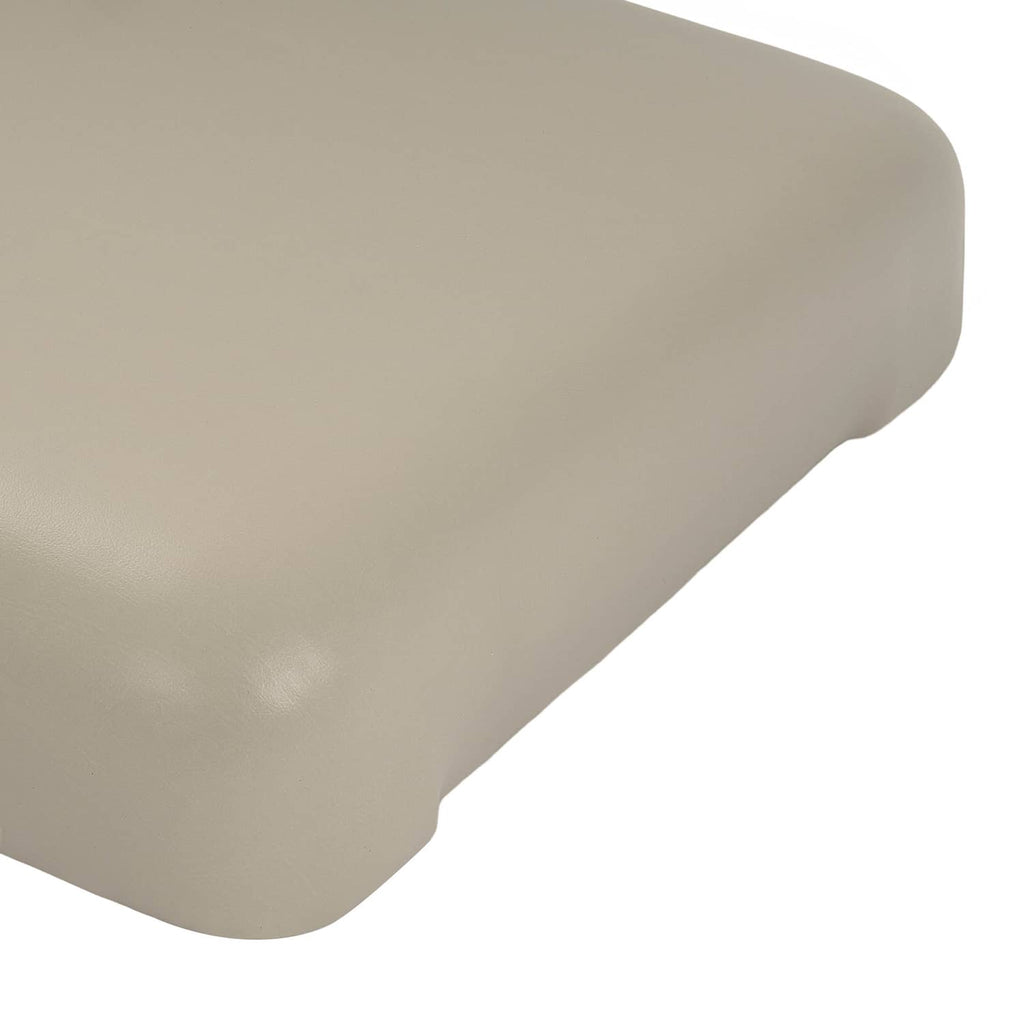 Beige cushion corner with smooth vinyl-like texture and rounded outer edge