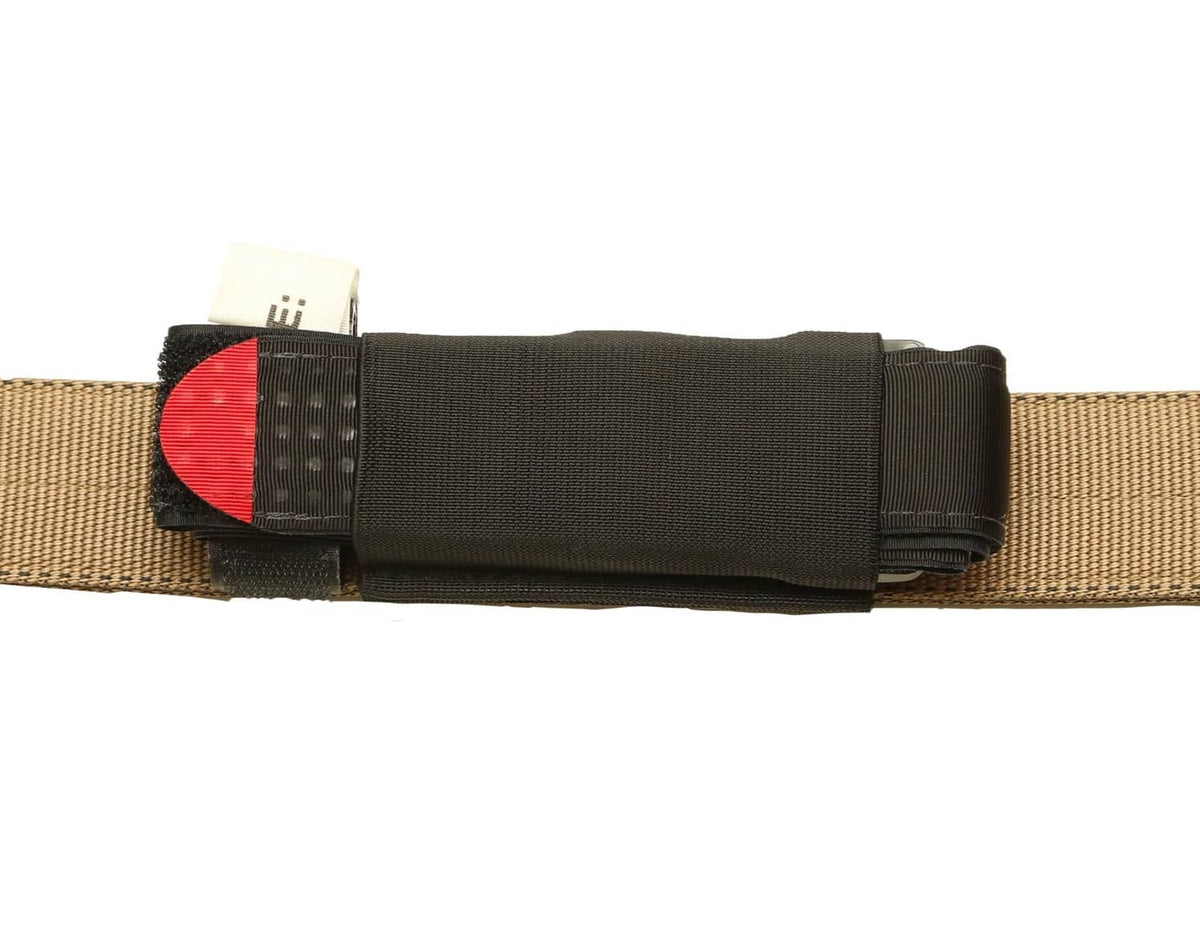 Black elastic tourniquet holder for belts with hook-and-loop closure and flap