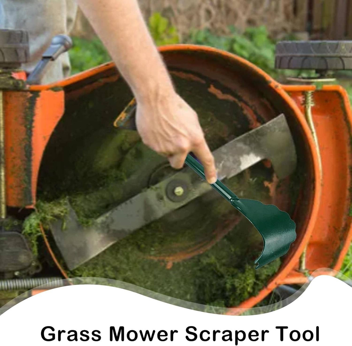Mower deck scraper angled on an orange mower deck, green blade on long handle