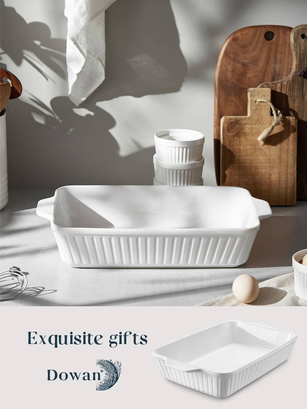 White ceramic casserole dish, rectangular deep pan with ribbed exterior and side grips.