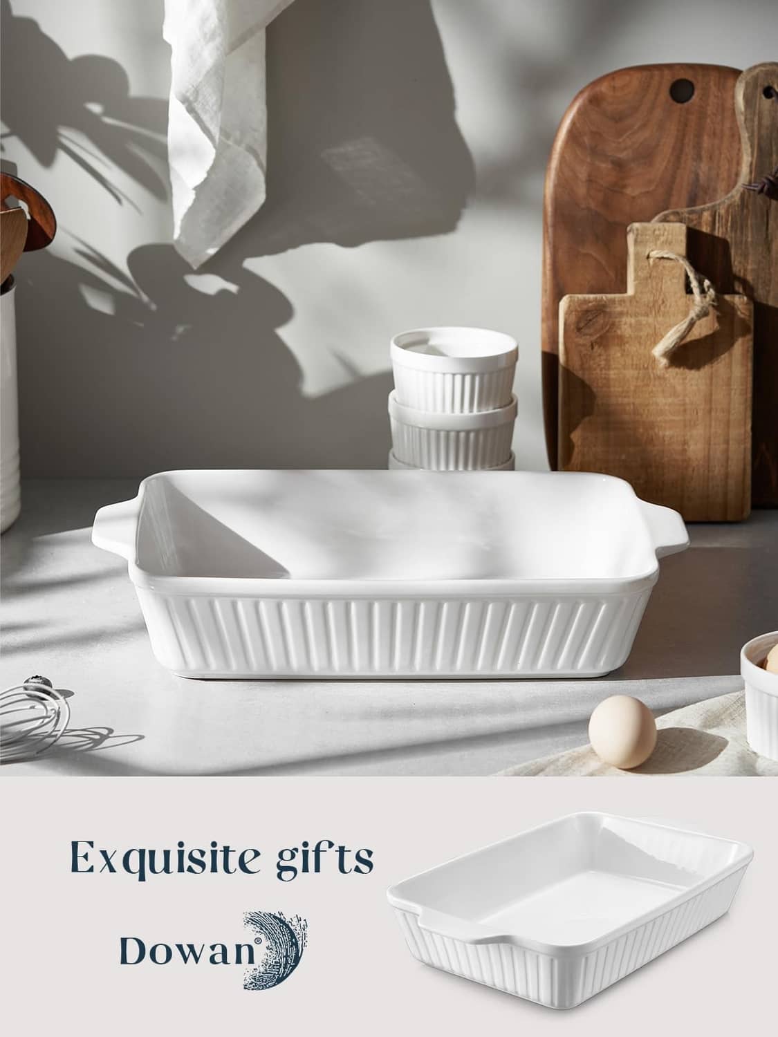 White ceramic casserole dish, rectangular deep pan with ribbed exterior and side grips.