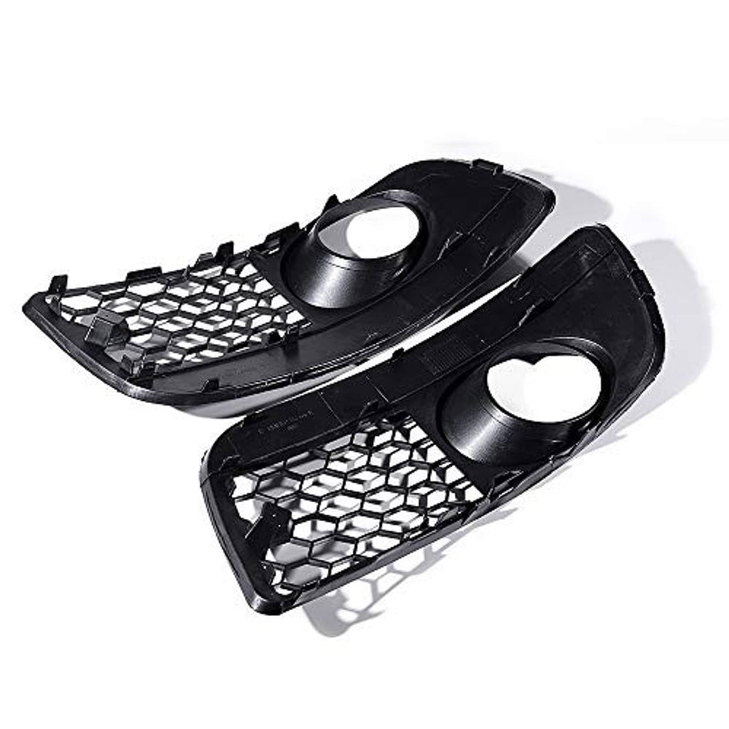Angled view of a set of 2 matte black fog light grille covers, round lamp openings