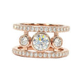 Rose gold-tone jacket ring with round center stone and clear round side stones