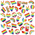 Assorted rainbow Pride enamel pins, including hearts, rainbows, and hand symbols.
