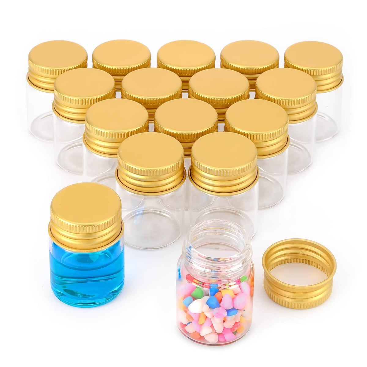 Set of small clear glass sample vials with gold screw caps, some filled with blue liquid