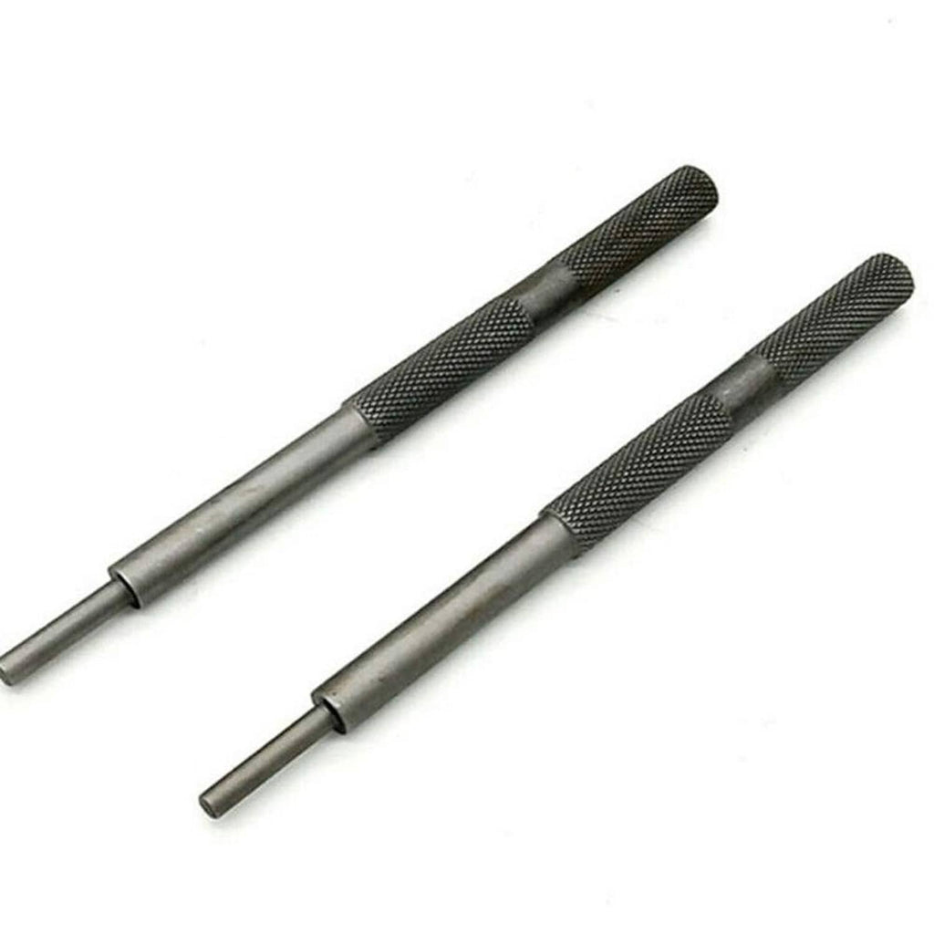 Pair of engine valve guide remover tools with knurled grips and pointed tips
