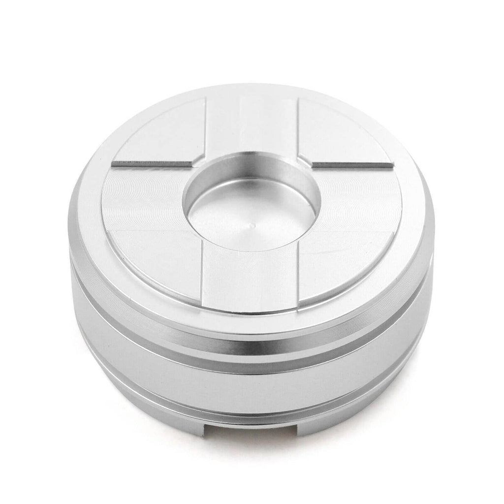 Silver forward accumulator piston with recessed center and black perimeter seal