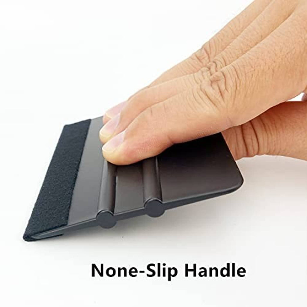 Vinyl squeegee tool with non-slip handle, held for smooth scraping
