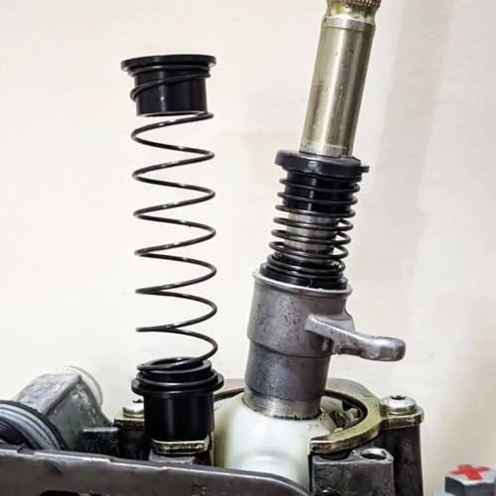 Manual transmission shifter repair kit with stacked springs and metal shift lever