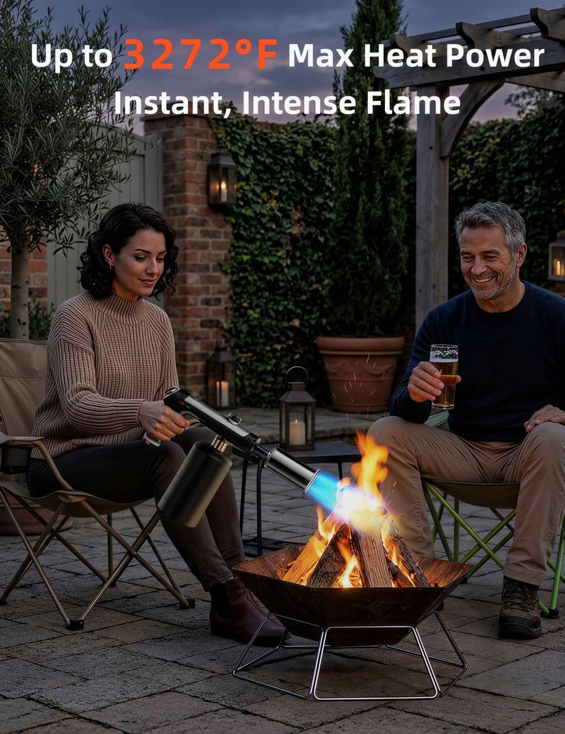 Black propane torch gun producing blue-orange flame over an outdoor fire pit