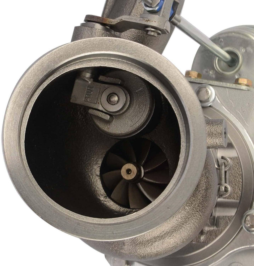 Turbocharger turbine housing close-up showing fan blades and inlet ring