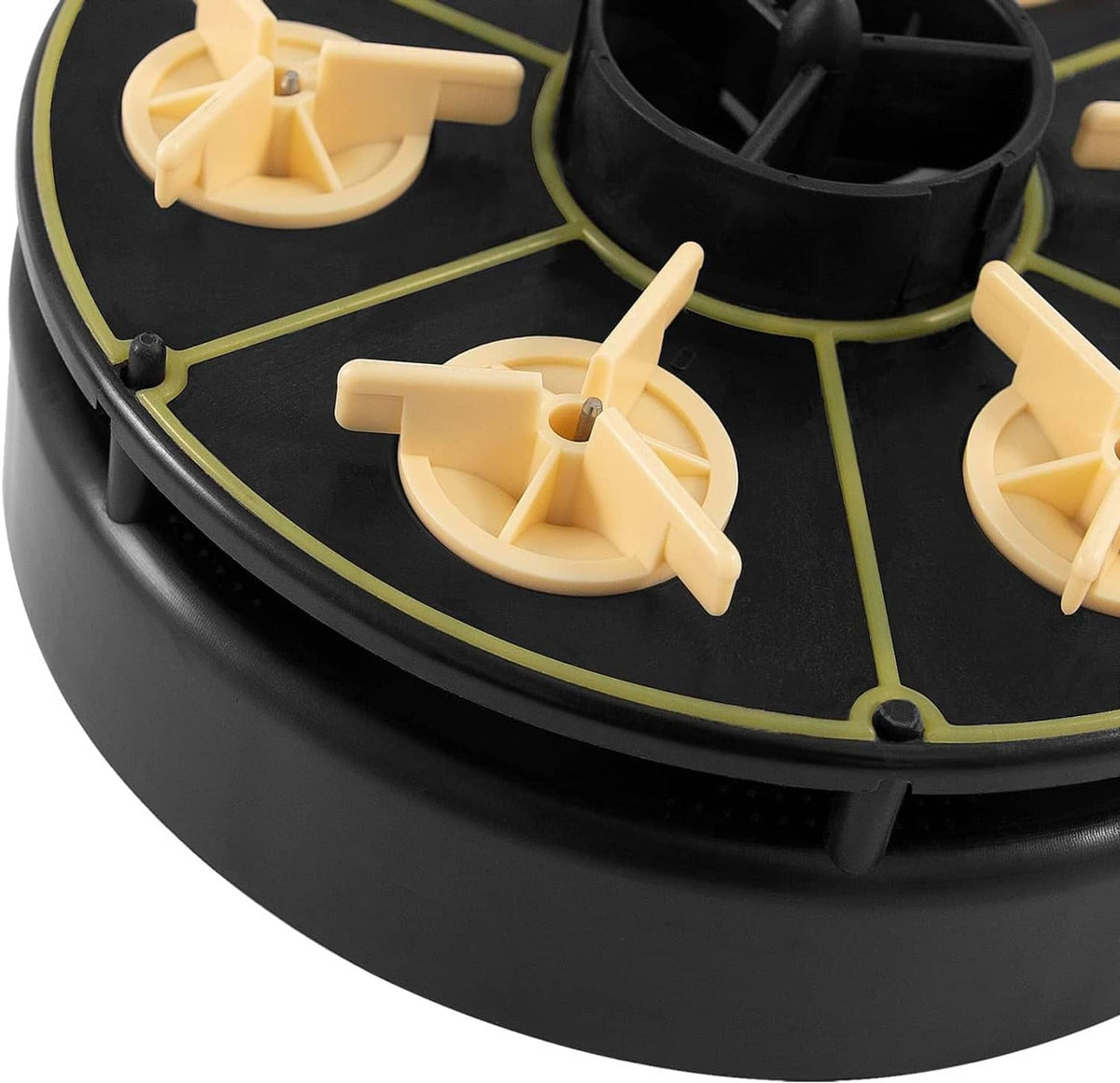 Close-up of beige impeller inserts inside black 6-port valve module