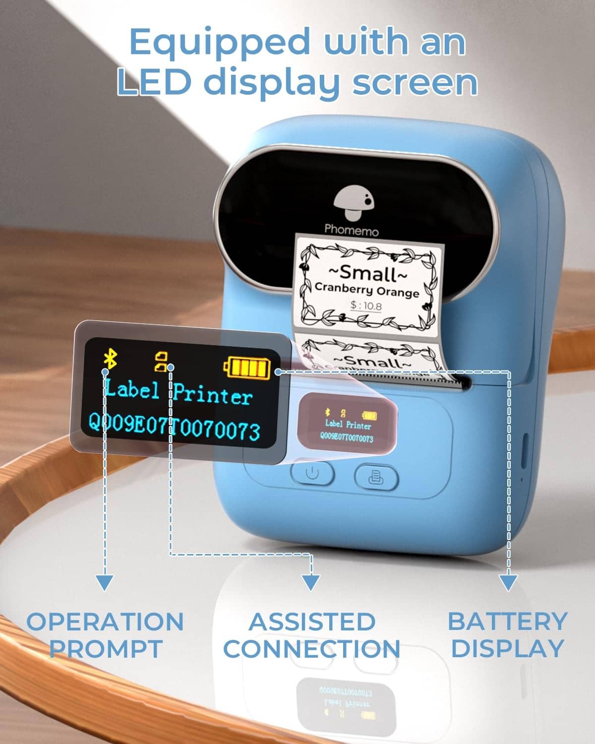 Blue label printer with LED display and printed label coming out