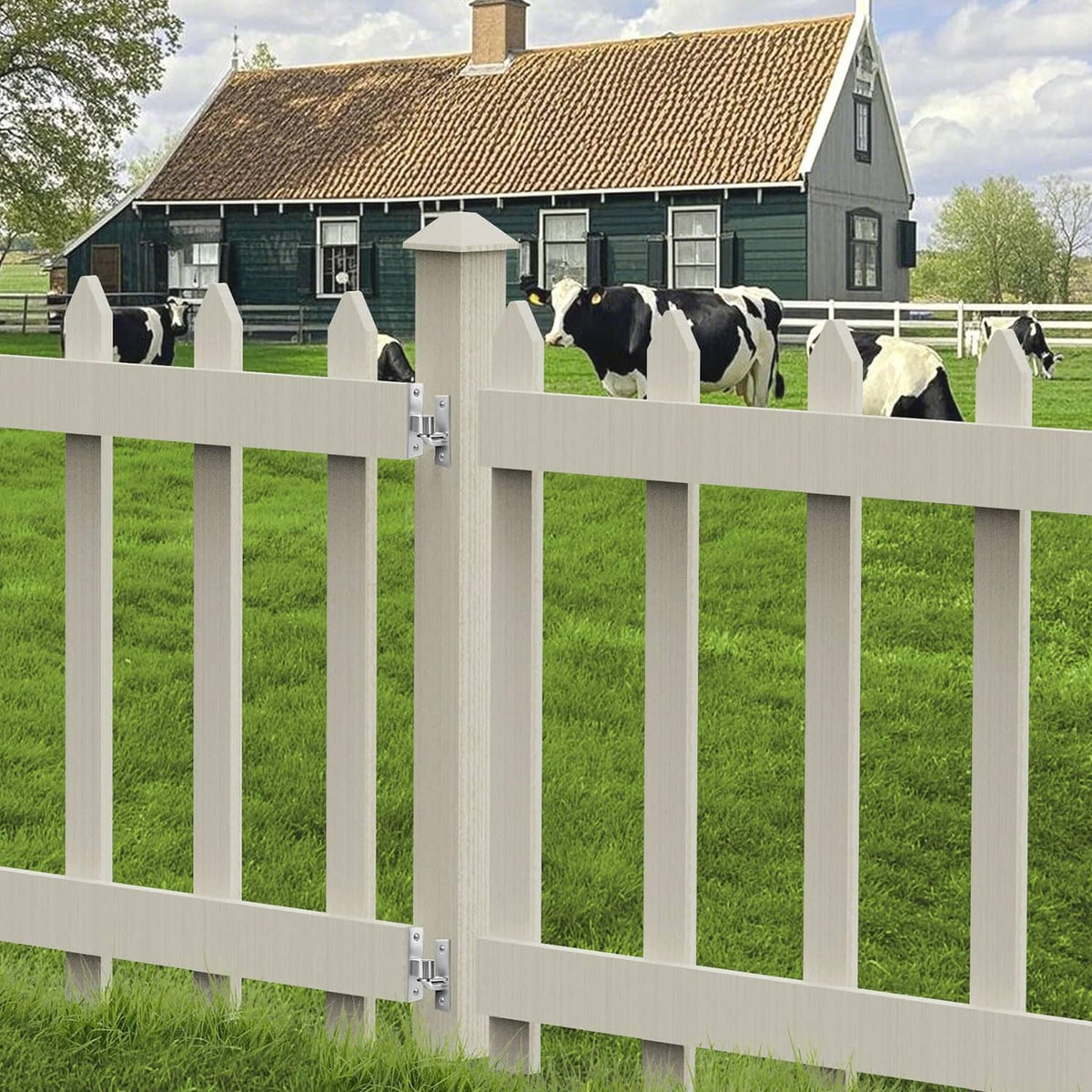 White farm gate with wall-mounted hinge hardware on the fence post