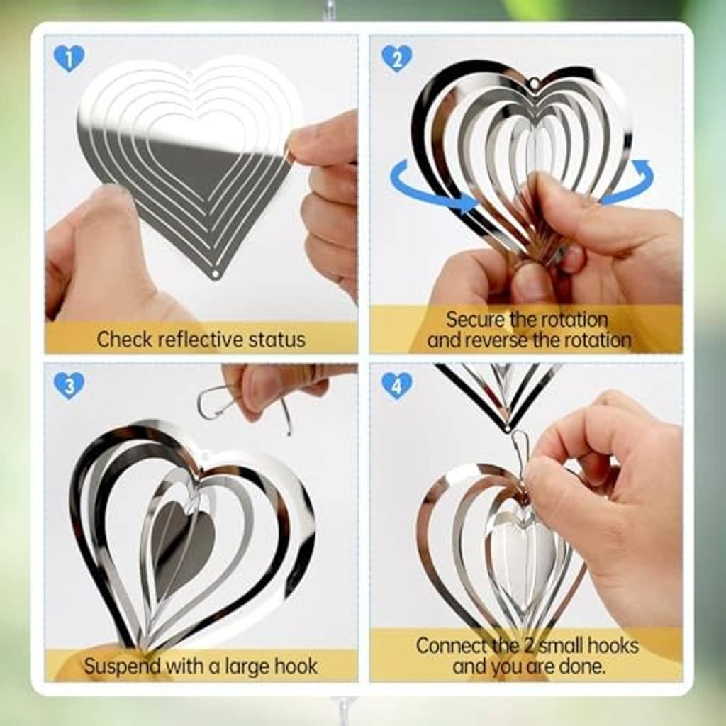 Reflective heart wind spinner assembly with hanging chain and rotating heart discs