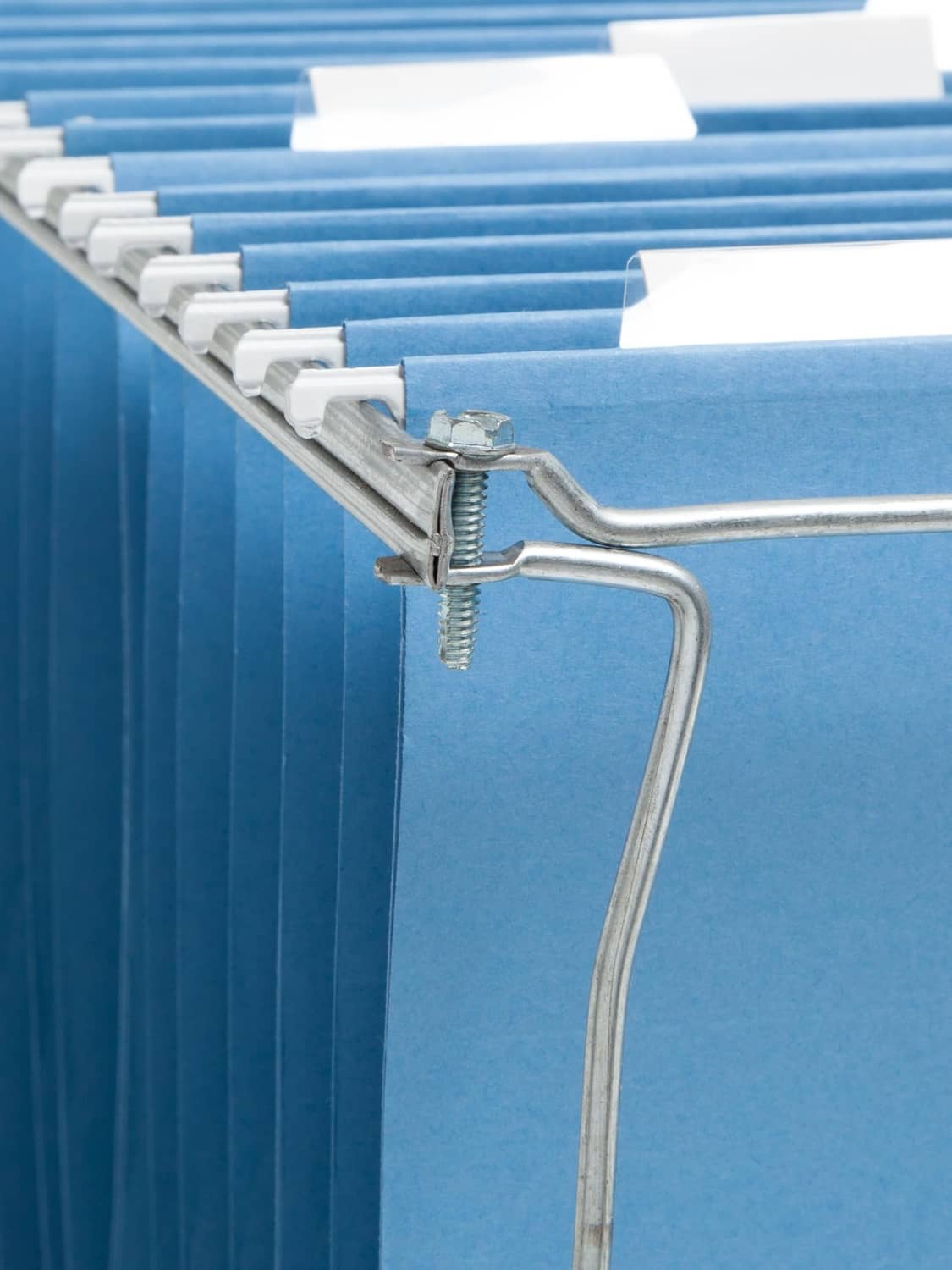 Close-up of gray metal hanging file frame clamp with adjustable hanger