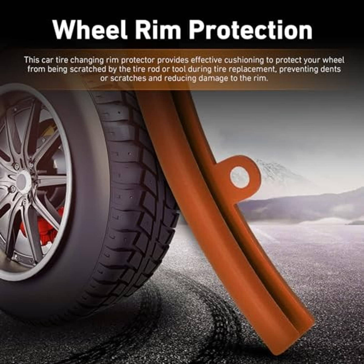 Orange wheel rim protection pads with yellow rope, beside a car tire and rim