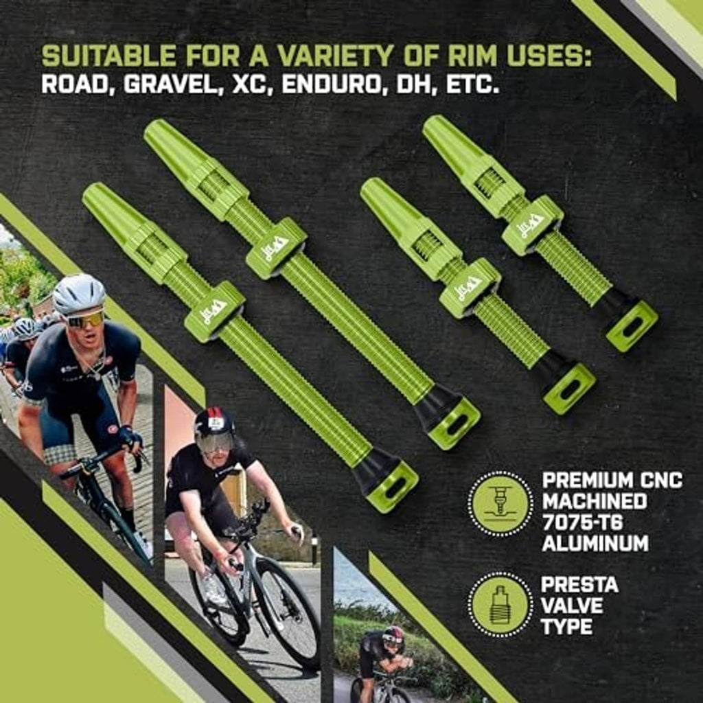 Neon green Presta tubeless valve stem set with black valve bases and metal caps.
