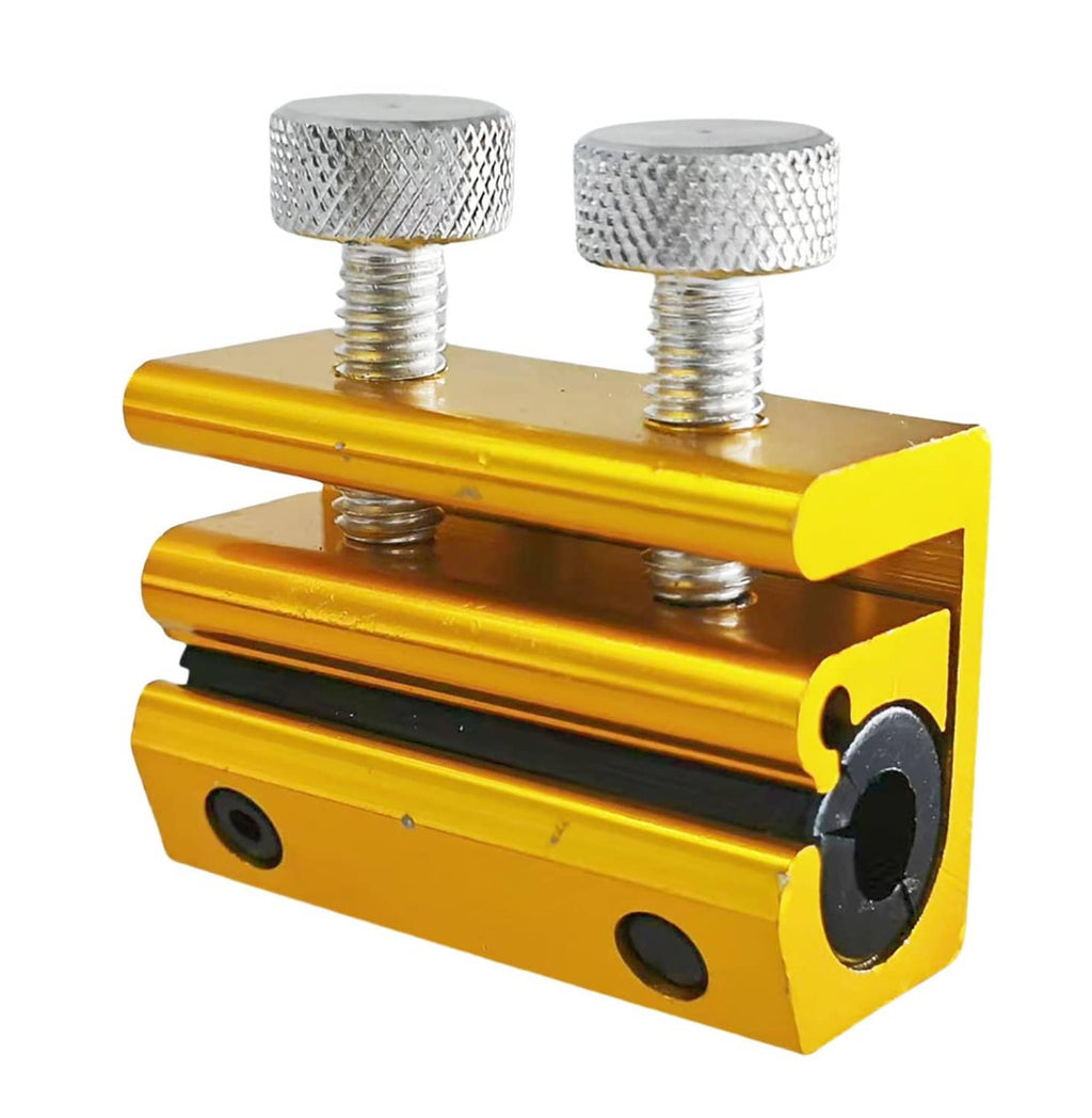Gold metal cable lubrication tool with two knurled caps and black connector openings.