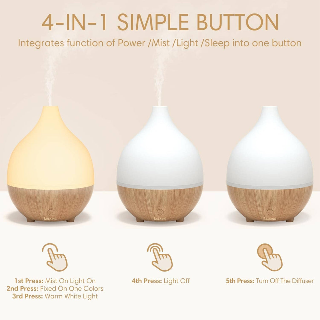 Three essential oil diffusers with white/cream tops and light wood bases