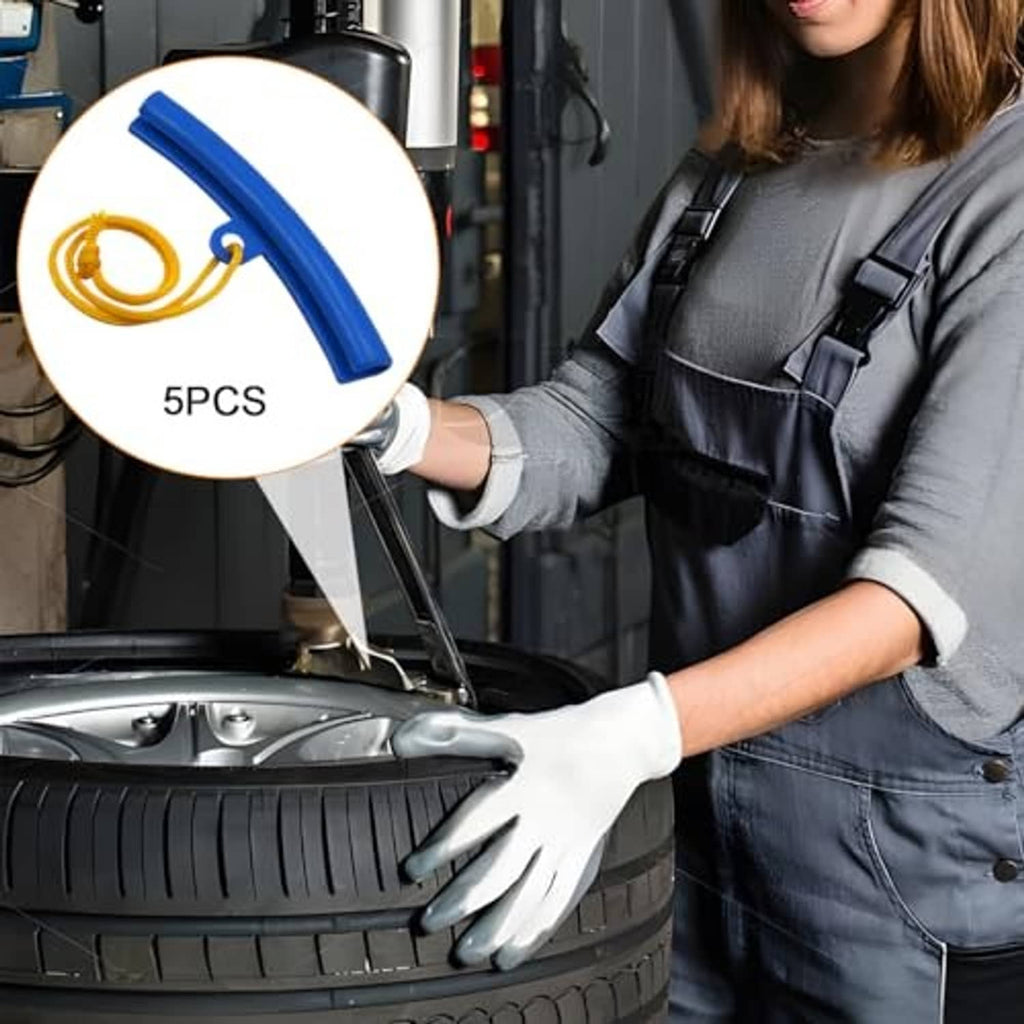 Five-piece blue rim protector kit with yellow loops for safe wheel changing