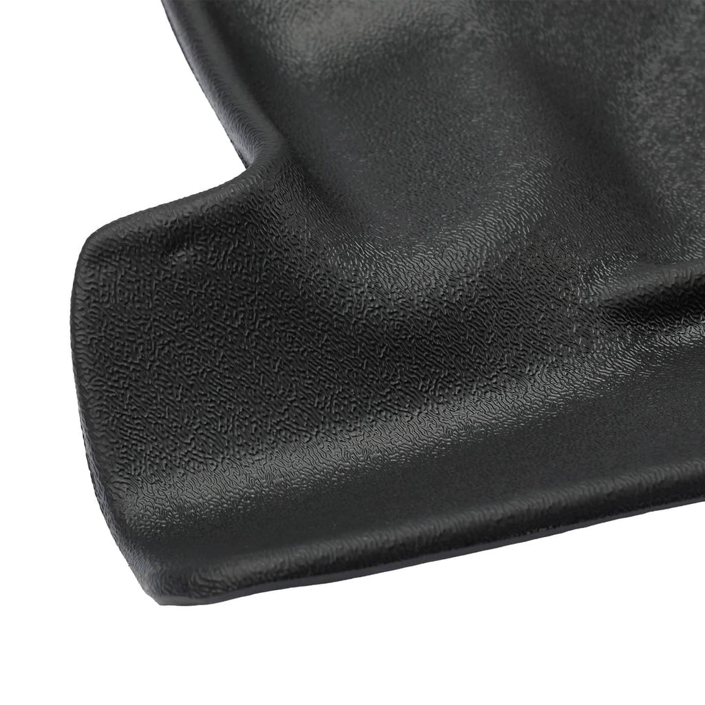 Close-up of black floor mat liner edge with molded border
