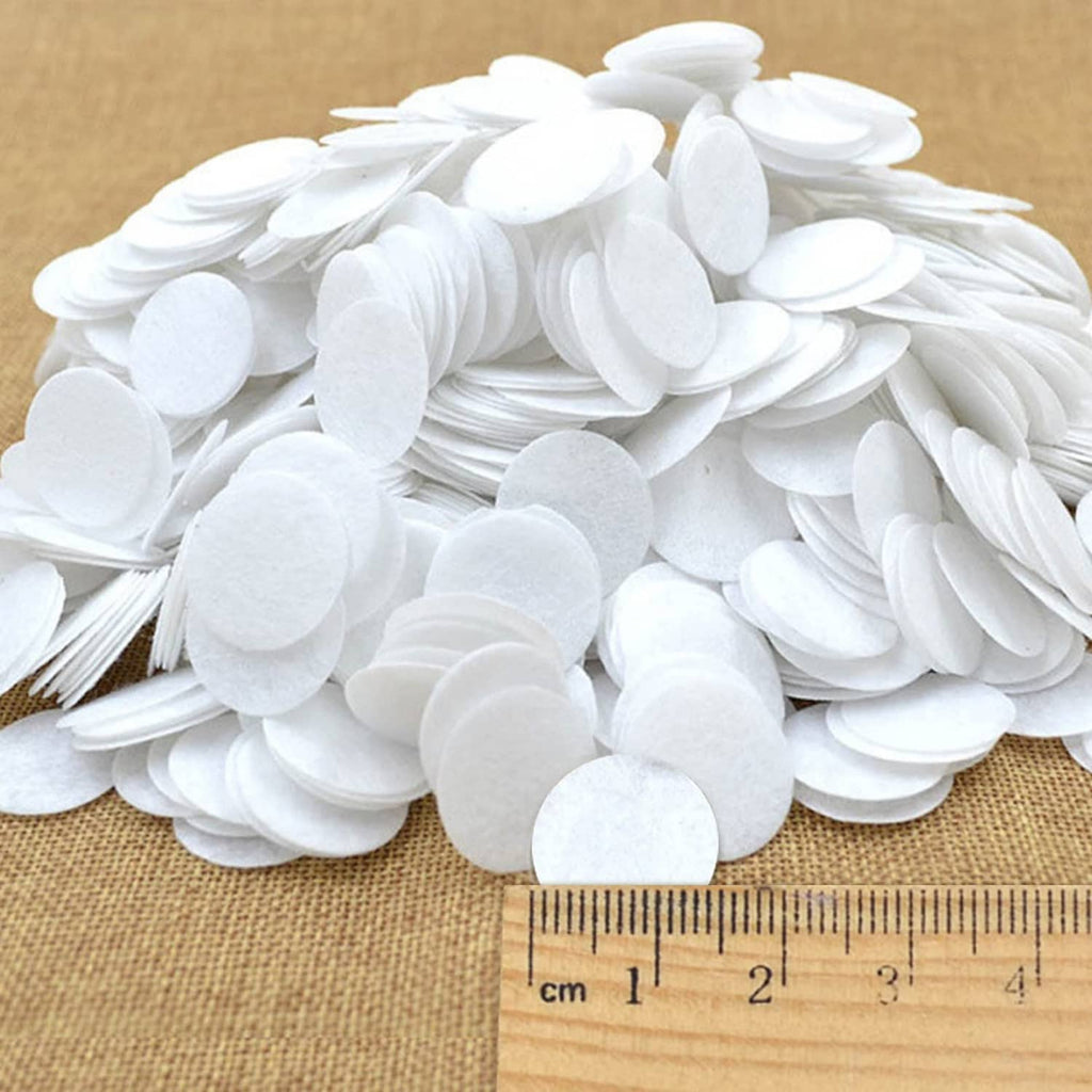 White microdermabrasion cotton filter discs with ruler scale, round felt pads