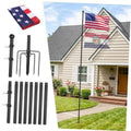 Black in-ground flag pole kit with mounting pieces and an American flag